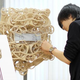 Illustration for article titled This Impossibly Complicated Mechanical Clock Re-Writes the Time Every Minute